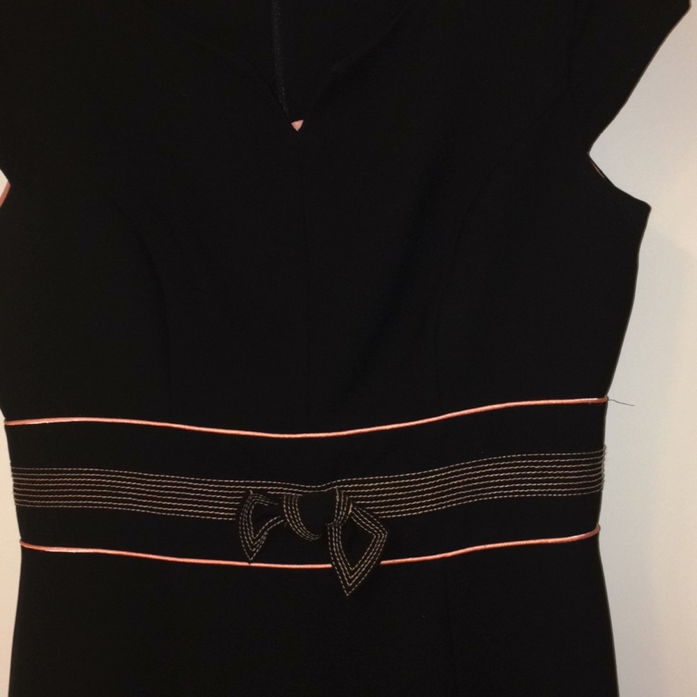 Black AGB knee length dress with v-neck.